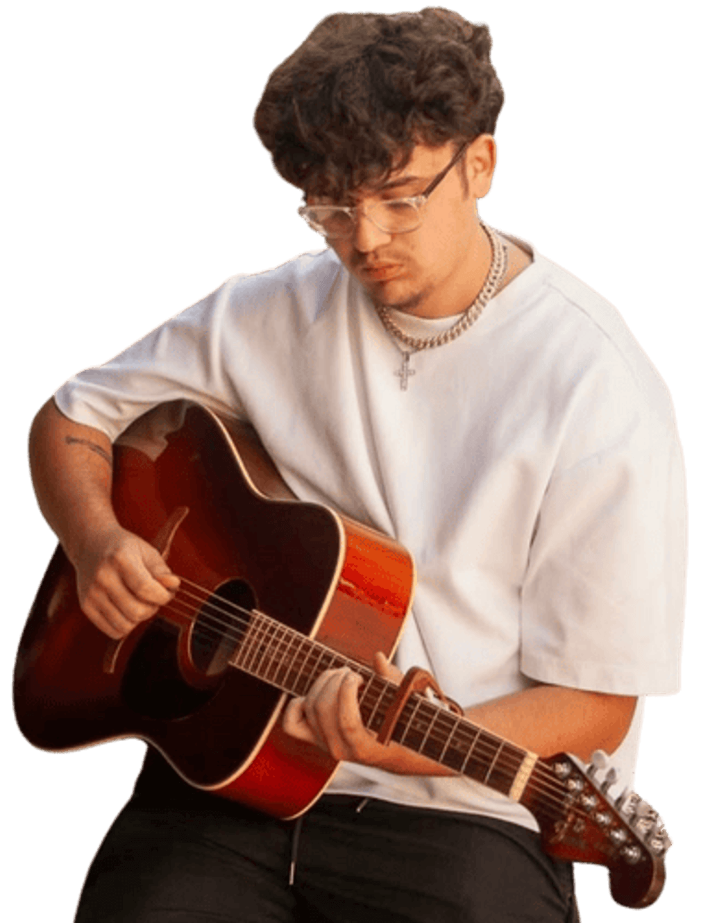 Jaxon Wood playing acoustic guitar